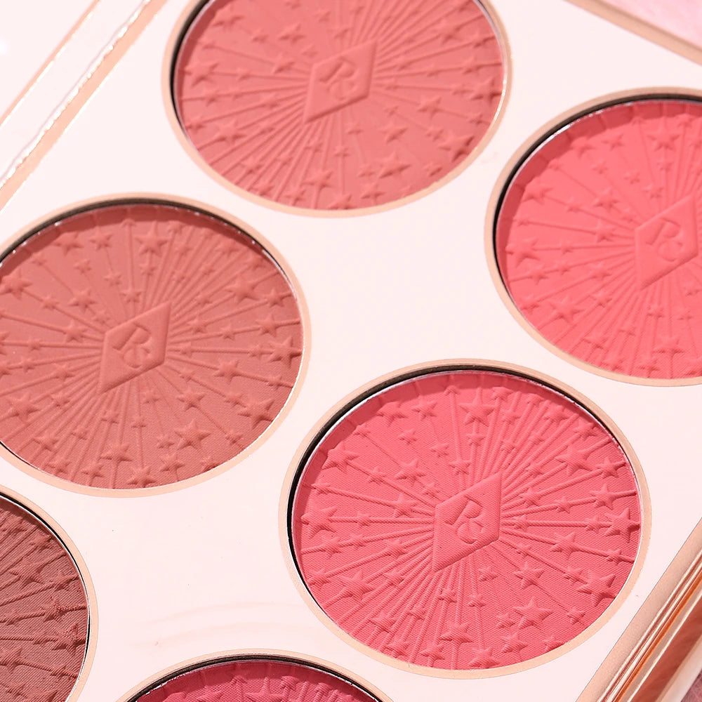 The makeup magic book contains eye shadow, lip gloss, powder blusher highlight, an ideal gift for women in holiday parties